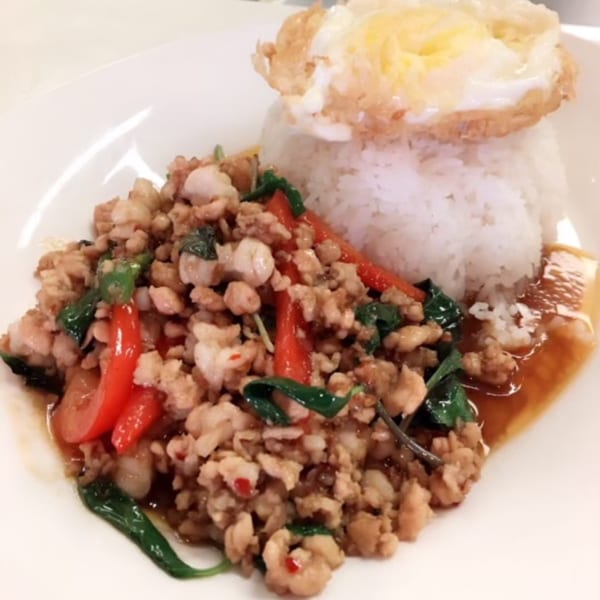 Sala Thai's Pad Krapow with minced chicken, red peppers, basil, rice, and a fried egg.